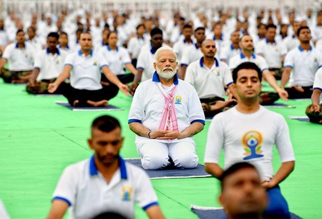 International Yoga Day 2023: India enthusiastically participates in Yoga celebrations, showcasing its diversity from aircraft carriers to high altitudes.